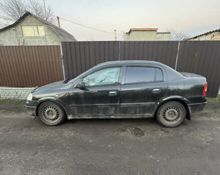 Черный Опель Астра, объемом двигателя 1.6 л и пробегом 240 тыс. км за 2500 $, фото 5 на Automoto.ua