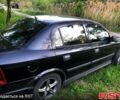 Черный Опель Астра, объемом двигателя 1.4 л и пробегом 122 тыс. км за 4000 $, фото 1 на Automoto.ua
