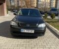 Черный Опель Астра, объемом двигателя 1.4 л и пробегом 253 тыс. км за 4100 $, фото 1 на Automoto.ua
