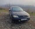 Черный Опель Астра, объемом двигателя 1.39 л и пробегом 180 тыс. км за 2550 $, фото 4 на Automoto.ua