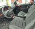 Черный Опель Астра, объемом двигателя 1.36 л и пробегом 300 тыс. км за 2150 $, фото 7 на Automoto.ua