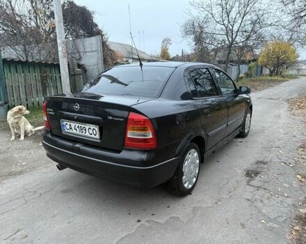 Черный Опель Астра, объемом двигателя 1.6 л и пробегом 250 тыс. км за 3750 $, фото 6 на Automoto.ua