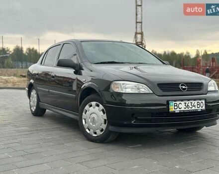 Черный Опель Астра, объемом двигателя 1.4 л и пробегом 216 тыс. км за 3999 $, фото 29 на Automoto.ua