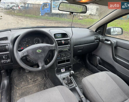 Черный Опель Астра, объемом двигателя 1.7 л и пробегом 300 тыс. км за 2999 $, фото 15 на Automoto.ua