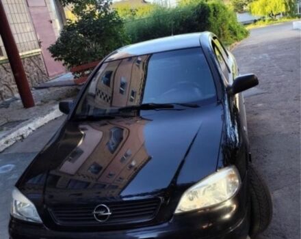 Черный Опель Астра, объемом двигателя 1.4 л и пробегом 176 тыс. км за 3850 $, фото 2 на Automoto.ua