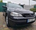 Черный Опель Астра, объемом двигателя 1.4 л и пробегом 157 тыс. км за 3850 $, фото 1 на Automoto.ua