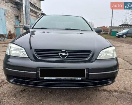 Черный Опель Астра, объемом двигателя 1.4 л и пробегом 230 тыс. км за 4500 $, фото 5 на Automoto.ua