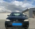 Черный Опель Астра, объемом двигателя 1.4 л и пробегом 183 тыс. км за 3500 $, фото 1 на Automoto.ua