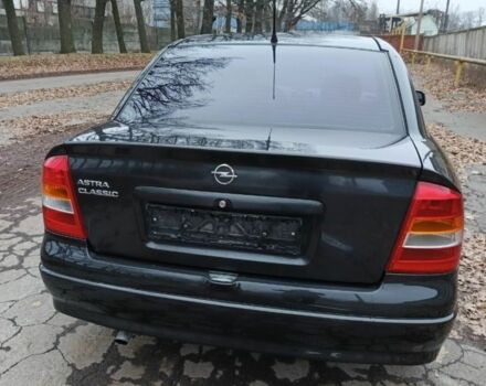 Черный Опель Астра, объемом двигателя 1.4 л и пробегом 175 тыс. км за 148000 $, фото 3 на Automoto.ua