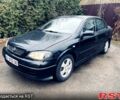 Черный Опель Астра, объемом двигателя 1.7 л и пробегом 298 тыс. км за 3400 $, фото 1 на Automoto.ua