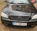 Черный Опель Астра, объемом двигателя 1.4 л и пробегом 260 тыс. км за 4000 $, фото 1 на Automoto.ua