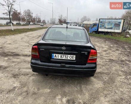 Черный Опель Астра, объемом двигателя 1.7 л и пробегом 300 тыс. км за 2999 $, фото 8 на Automoto.ua