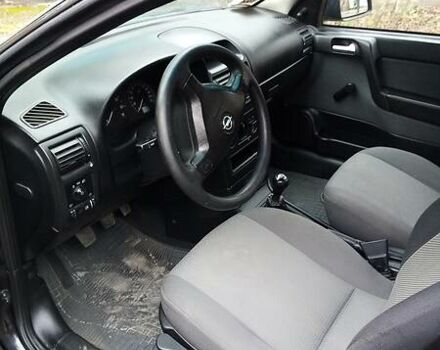 Черный Опель Астра, объемом двигателя 1.4 л и пробегом 155 тыс. км за 3700 $, фото 8 на Automoto.ua