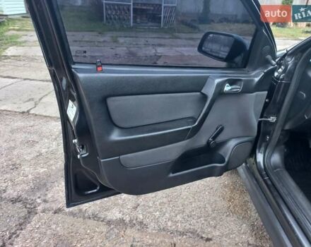 Черный Опель Астра, объемом двигателя 1.4 л и пробегом 230 тыс. км за 4500 $, фото 17 на Automoto.ua