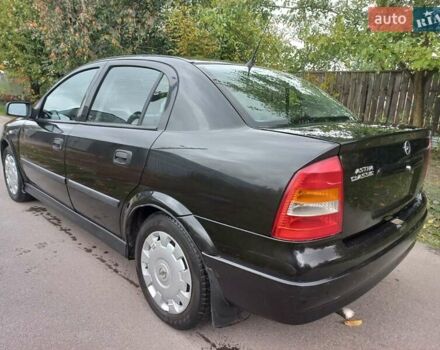 Черный Опель Астра, объемом двигателя 1.4 л и пробегом 220 тыс. км за 4500 $, фото 5 на Automoto.ua