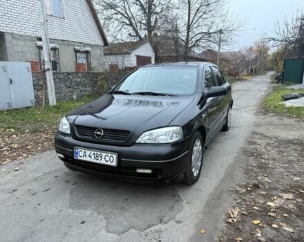 Черный Опель Астра, объемом двигателя 1.6 л и пробегом 250 тыс. км за 3750 $, фото 13 на Automoto.ua