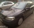 Черный Опель Астра, объемом двигателя 1.4 л и пробегом 180 тыс. км за 2100 $, фото 1 на Automoto.ua