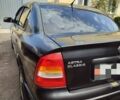 Черный Опель Астра, объемом двигателя 1.4 л и пробегом 200 тыс. км за 3500 $, фото 1 на Automoto.ua