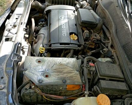 Черный Опель Астра, объемом двигателя 1.6 л и пробегом 170 тыс. км за 1300 $, фото 6 на Automoto.ua