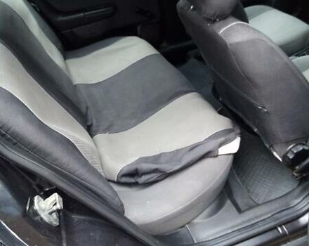 Черный Опель Астра, объемом двигателя 1.4 л и пробегом 155 тыс. км за 3700 $, фото 5 на Automoto.ua