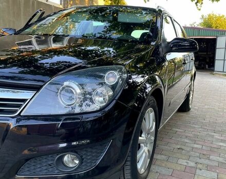 Черный Опель Астра, объемом двигателя 1.8 л и пробегом 234 тыс. км за 7700 $, фото 4 на Automoto.ua