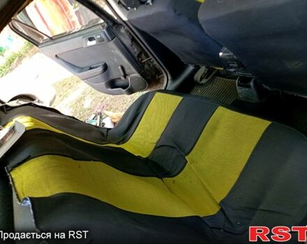 Черный Опель Астра, объемом двигателя 1.6 л и пробегом 170 тыс. км за 1300 $, фото 3 на Automoto.ua