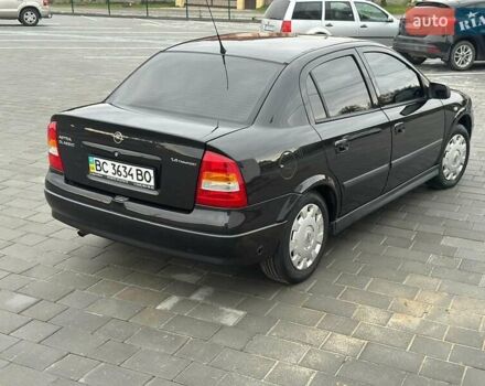 Черный Опель Астра, объемом двигателя 1.4 л и пробегом 216 тыс. км за 3999 $, фото 9 на Automoto.ua