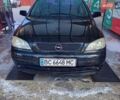 Черный Опель Астра, объемом двигателя 1.4 л и пробегом 201 тыс. км за 3650 $, фото 1 на Automoto.ua