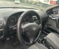 Черный Опель Астра, объемом двигателя 1.4 л и пробегом 216 тыс. км за 3999 $, фото 24 на Automoto.ua
