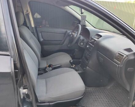 Черный Опель Астра, объемом двигателя 1.6 л и пробегом 100 тыс. км за 2800 $, фото 11 на Automoto.ua