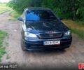 Черный Опель Астра, объемом двигателя 1.4 л и пробегом 200 тыс. км за 4300 $, фото 1 на Automoto.ua