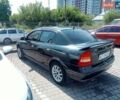 Черный Опель Астра, объемом двигателя 1.39 л и пробегом 150 тыс. км за 2300 $, фото 1 на Automoto.ua