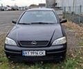 Черный Опель Астра, объемом двигателя 1.4 л и пробегом 180 тыс. км за 3800 $, фото 1 на Automoto.ua