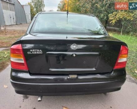 Черный Опель Астра, объемом двигателя 1.4 л и пробегом 220 тыс. км за 4500 $, фото 6 на Automoto.ua