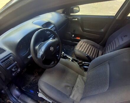 Черный Опель Астра, объемом двигателя 1.4 л и пробегом 300 тыс. км за 1300 $, фото 5 на Automoto.ua