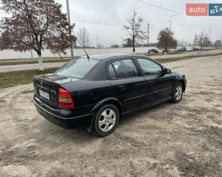 Черный Опель Астра, объемом двигателя 1.7 л и пробегом 300 тыс. км за 2999 $, фото 6 на Automoto.ua