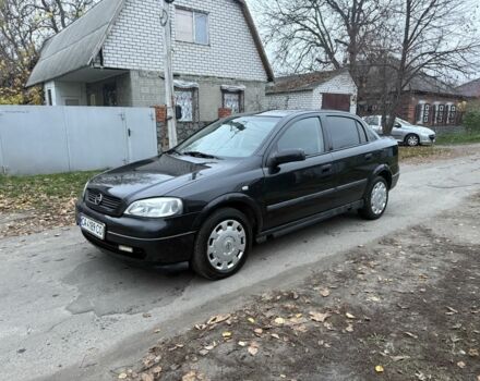 Черный Опель Астра, объемом двигателя 1.6 л и пробегом 250 тыс. км за 3750 $, фото 1 на Automoto.ua