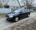 Черный Опель Астра, объемом двигателя 1.6 л и пробегом 250 тыс. км за 3750 $, фото 1 на Automoto.ua