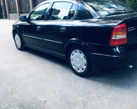 Черный Опель Астра, объемом двигателя 1.4 л и пробегом 230 тыс. км за 3800 $, фото 10 на Automoto.ua