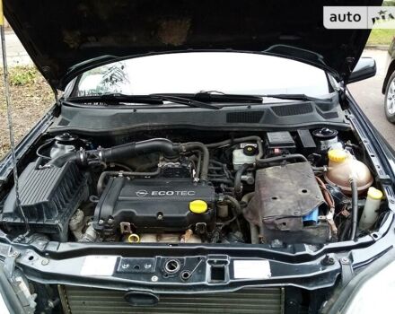 Черный Опель Астра, объемом двигателя 1.4 л и пробегом 155 тыс. км за 3700 $, фото 1 на Automoto.ua