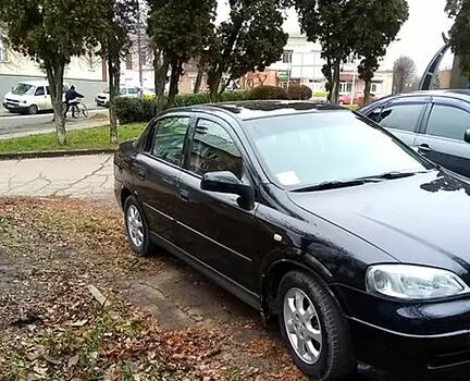 Черный Опель Астра, объемом двигателя 1.4 л и пробегом 155 тыс. км за 3500 $, фото 9 на Automoto.ua
