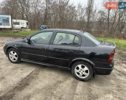 Черный Опель Астра, объемом двигателя 1.7 л и пробегом 300 тыс. км за 2999 $, фото 11 на Automoto.ua