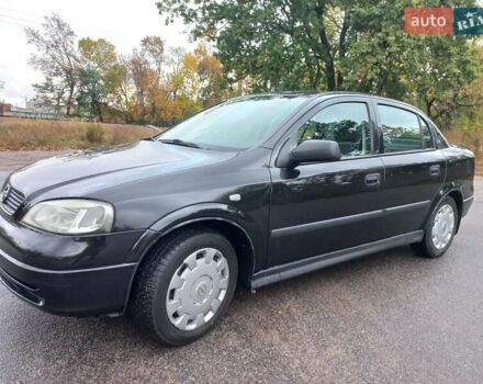 Черный Опель Астра, объемом двигателя 1.4 л и пробегом 230 тыс. км за 4500 $, фото 1 на Automoto.ua