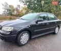 Черный Опель Астра, объемом двигателя 1.4 л и пробегом 230 тыс. км за 4500 $, фото 1 на Automoto.ua