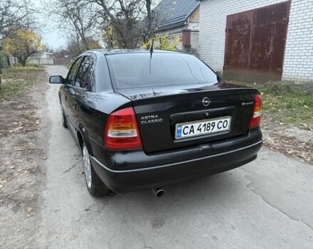 Черный Опель Астра, объемом двигателя 1.6 л и пробегом 250 тыс. км за 3750 $, фото 3 на Automoto.ua