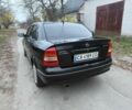 Черный Опель Астра, объемом двигателя 1.6 л и пробегом 250 тыс. км за 3750 $, фото 3 на Automoto.ua