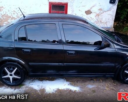 Черный Опель Астра, объемом двигателя 1.6 л и пробегом 256 тыс. км за 3300 $, фото 4 на Automoto.ua