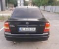 Черный Опель Астра, объемом двигателя 1.4 л и пробегом 189 тыс. км за 2350 $, фото 6 на Automoto.ua