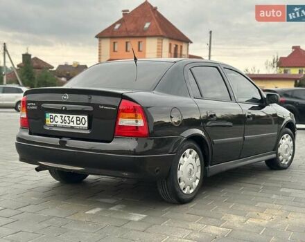 Черный Опель Астра, объемом двигателя 1.4 л и пробегом 216 тыс. км за 3999 $, фото 6 на Automoto.ua