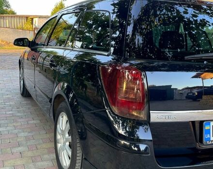 Черный Опель Астра, объемом двигателя 1.8 л и пробегом 234 тыс. км за 7700 $, фото 3 на Automoto.ua